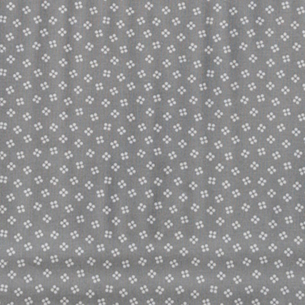 Tela agujeros sobre gris de la colección Coser y Tejer by Carme Salas de BCN Fabrics